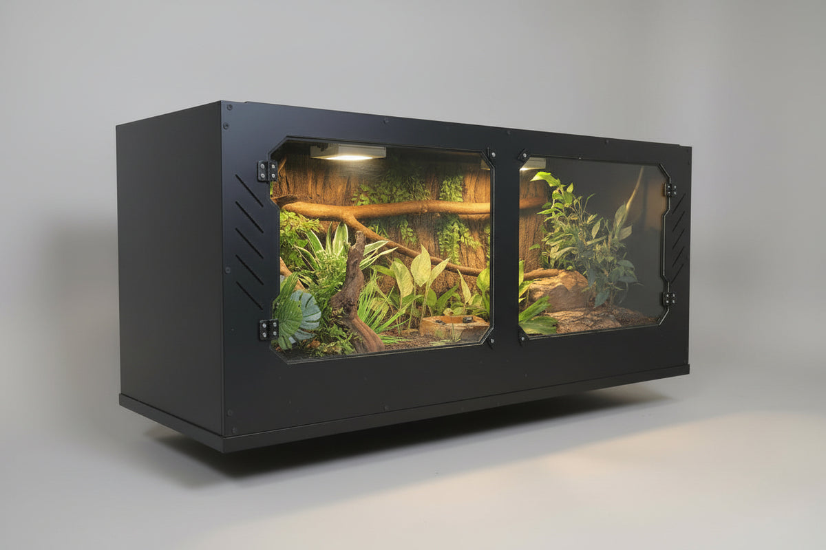 Large terrarium with plants and natural elements on wheels, surrounded by greenery.