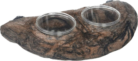 Dual feeding cups filled on natural rock ledge