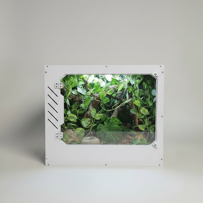 White Repticube PVC reptile enclosure with green plants inside on a white background