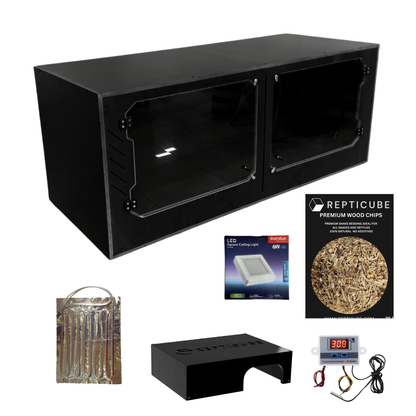 Collection of pet care products including a black reptile cage, LED light, wood chips, and temperature control device on a white background.