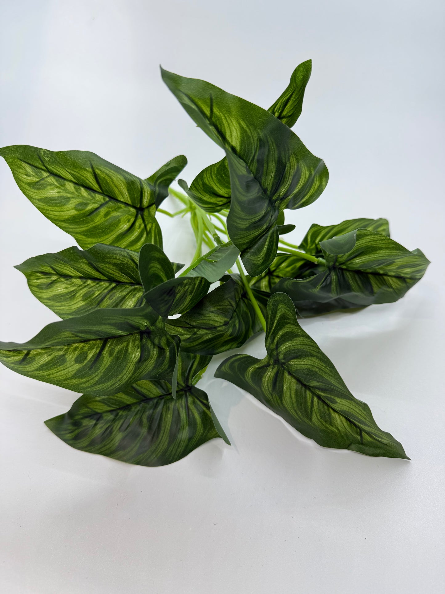 Detailed faux Prayer Plant leaves creating a natural feel in reptile habitats.