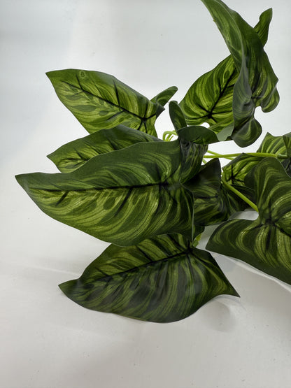 Detailed faux Prayer Plant leaves creating a natural feel in reptile habitats.