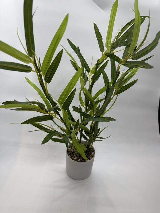 Realistic Tarragon artificial plant adding natural decor to a reptile enclosure