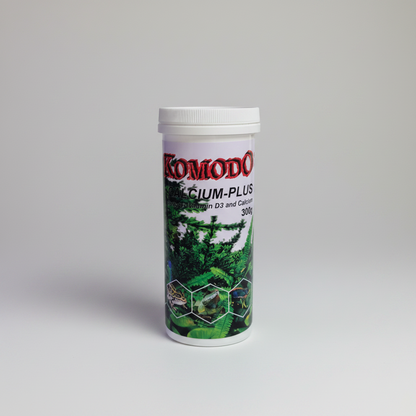 Komodo Calcium-Plus supplement container on a white background
