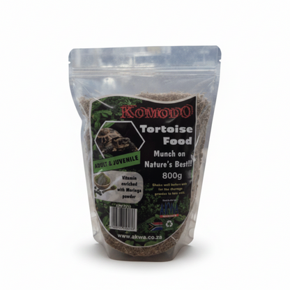 A 800g bag of Komodo Tortoise Food (Mandela on Nature's Diet) for bearded dragons, shown against a solid gray background.