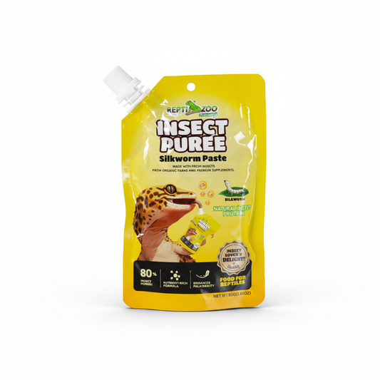 A yellow Reptile Zoo Insect Puree Silkworm Paste pouch with a white spout, featuring a gecko illustration and product details on a white background.