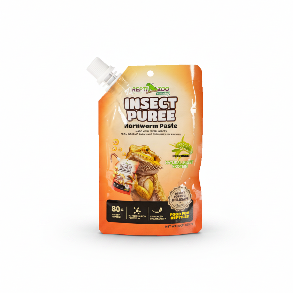 A stand-up pouch of Reptile Zoo Insect Puree dornworm paste, featuring an orange and yellow design with a cartoon bearded dragon and a white plastic spout, on a plain white background.