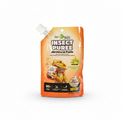 A stand-up pouch of Reptile Zoo Insect Puree dornworm paste, featuring an orange and yellow design with a cartoon bearded dragon and a white plastic spout, on a plain white background.